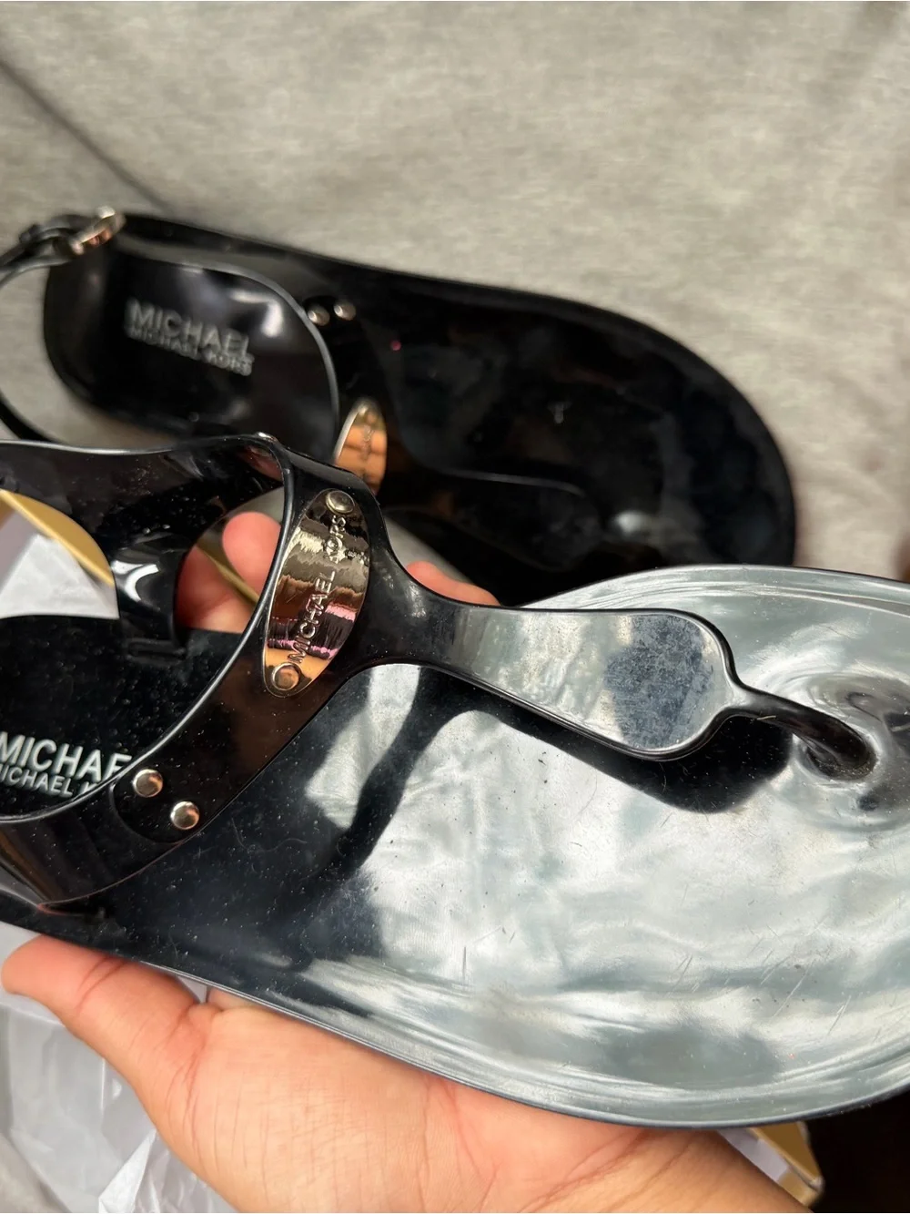 Michael Kors Black Glossy Jelly T-Strap Sandals with Logo Accent